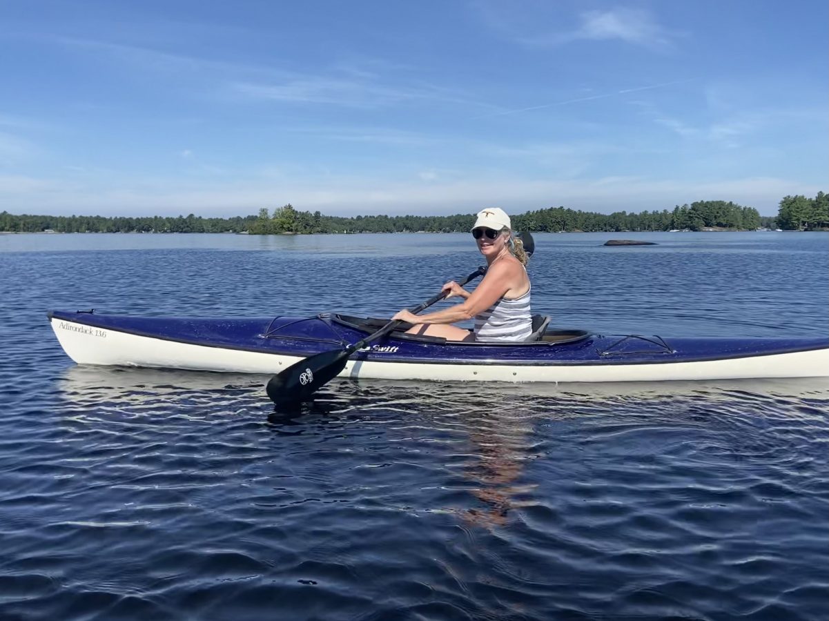 Sue Jamison paddling on Kahshe Lake